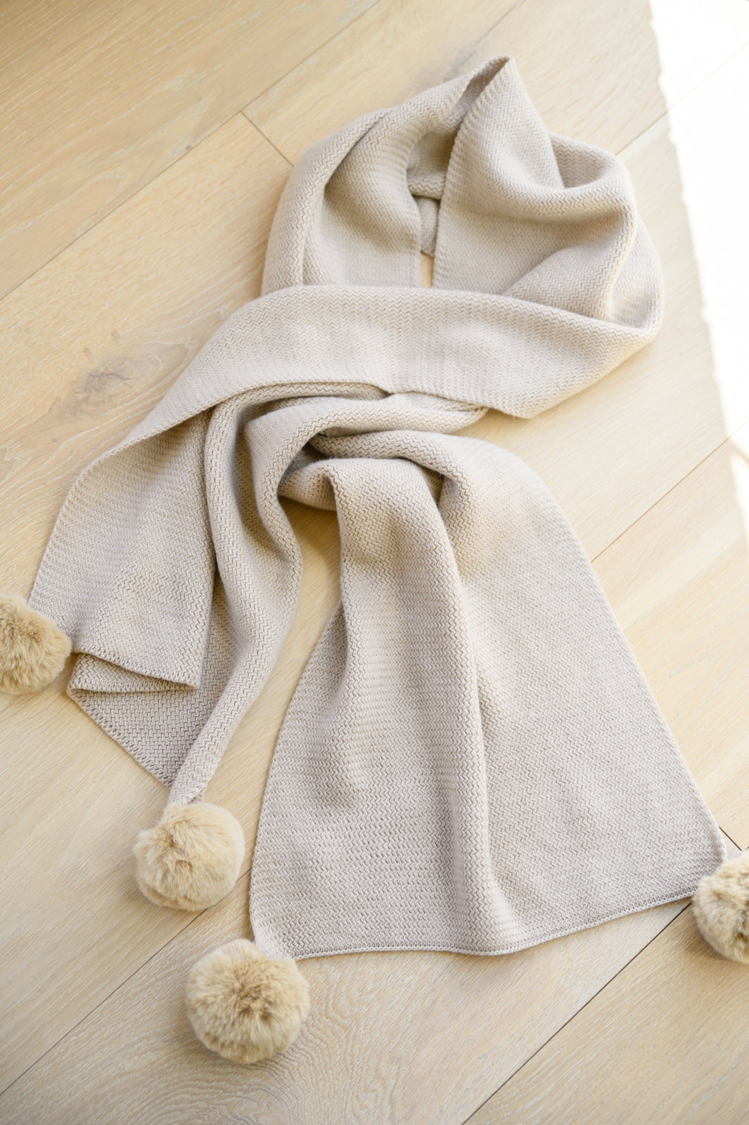 Knitted Fuzzy Pom Pom Scarf In Beige-Scarves-Inspired by Justeen-Women's Clothing Boutique in Chicago, Illinois